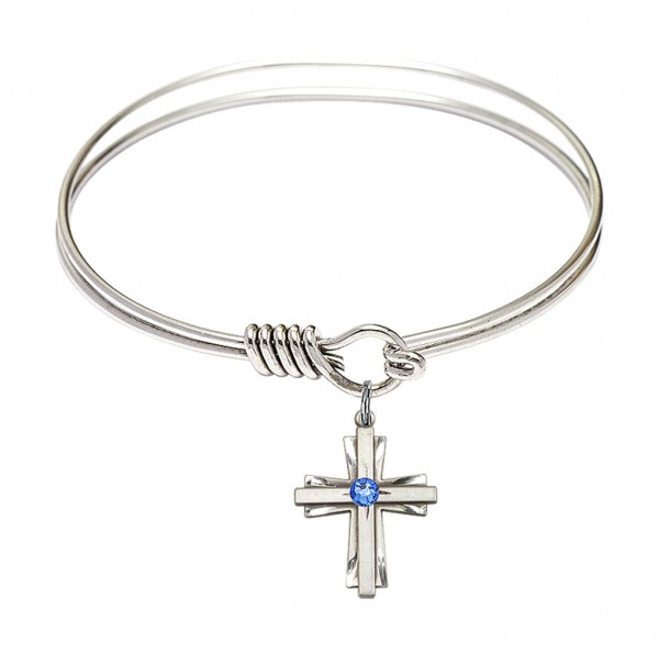 Smooth Bangle Bracelet with a Cross Charm - Sapphire